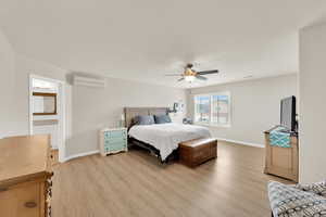 Bedroom featuring light wood-style flooring and ceiling fan