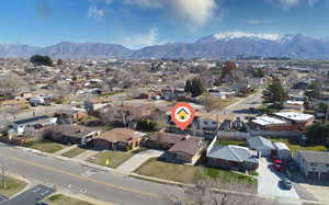 Aerial perspective of suburban area featuring mountains