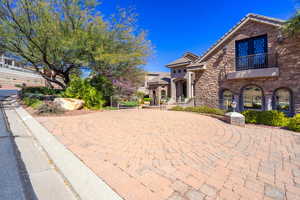 Mediterranean / spanish-style home featuring a balcony