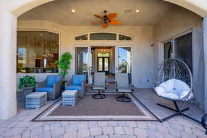 View of patio with ceiling fan