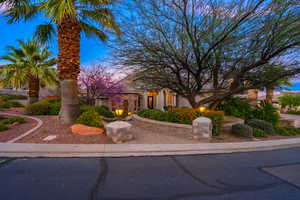 View of property hidden behind natural elements