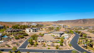 Aerial view of residential area with a mountainous background