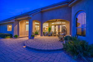 View of patio featuring ceiling fan and an outdoor hangout area