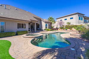 Integrated pool / spa featuring a patio