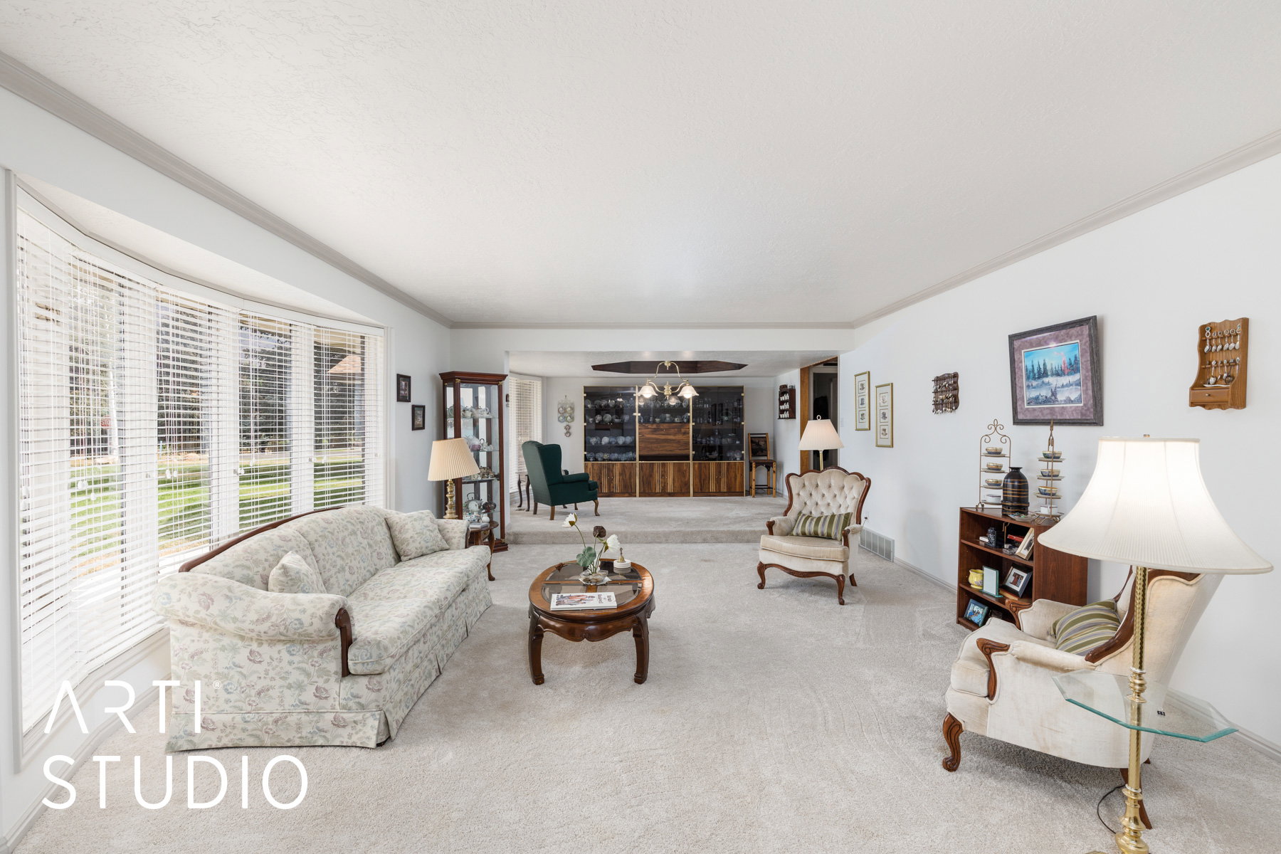 Formal living room with ornamental molding