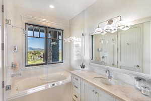 Bathroom featuring vanity and a mountain view