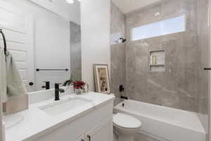Full bath featuring vanity and tub / shower combination