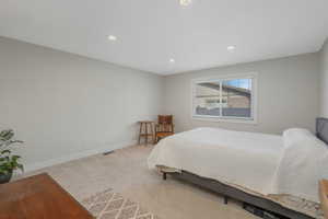 Bathroom featuring a textured ceiling, vanity, shower / bath combo, and light tile patterned floors