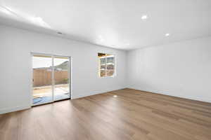 Spare room featuring recessed lighting and light wood-style flooring
