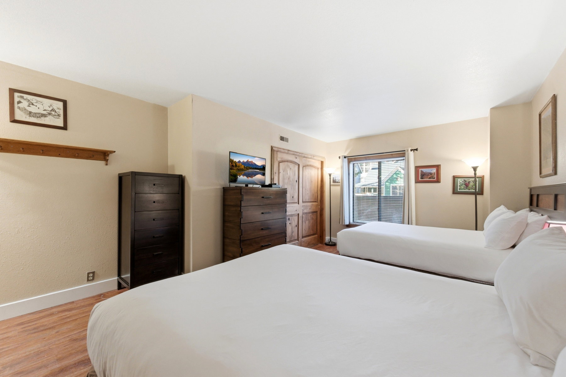 Bedroom featuring access to outside and light wood-type flooring