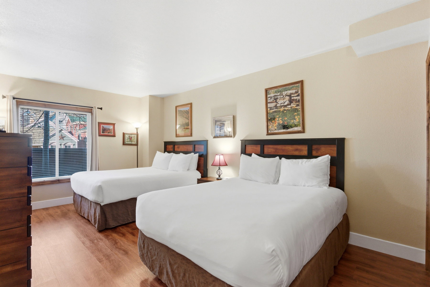 Bedroom featuring light wood-style floors and baseboards