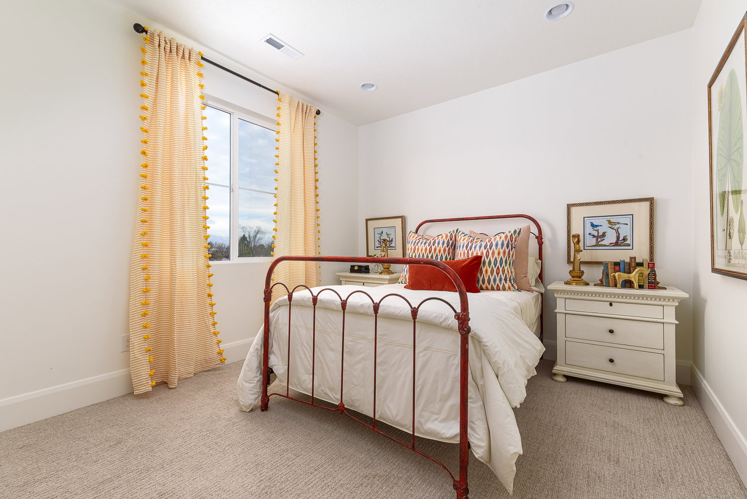 Bedroom with light carpet and recessed lighting