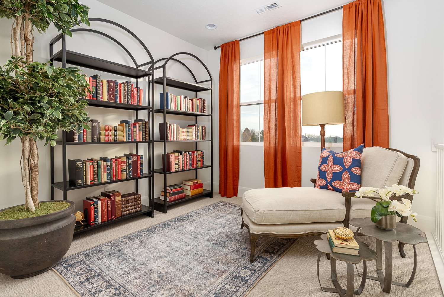 Sitting room featuring light colored carpet