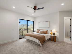 Bedroom featuring access to outside, a mountain view, light colored carpet, a ceiling fan, and recessed lighting