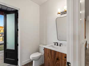 Bathroom with toilet and vanity