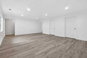 Unfurnished bedroom with recessed lighting and light wood finished floors