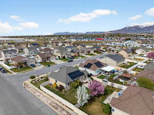 Aerial view of residential area featuring a mountainous background