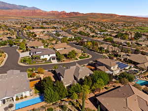 Aerial view of residential area with a mountain backdrop