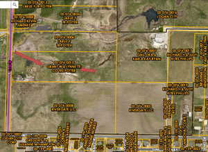 Aerial view of property's location with property parcel outlined