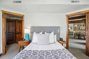 View of carpeted bedroom