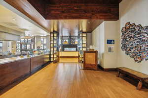 Interior space featuring light wood-style flooring and wooden ceiling