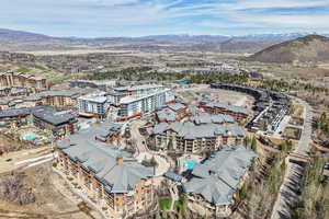 Bird's eye view of mountains and apartment complex