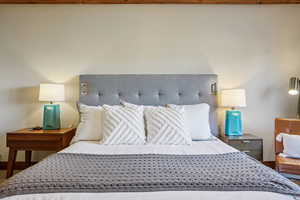 Bedroom featuring baseboards