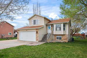 Welcoming curb appeal with a 2-car garage, mature trees, and a well-maintained exterior. Move-in ready in a convenient location just 15 minutes to HAFB.