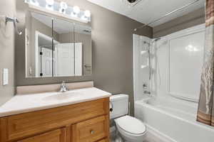 Bright basement bathroom featuring a full tub/shower combo, spacious vanity, and excellent lighting. Clean, functional design with great storage.  Perfect for guests or additional living space.