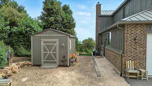 View of shed with a garage