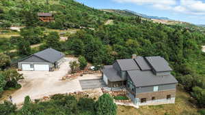 View of subject property with a mountain backdrop