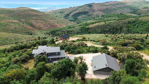 View of subject property with a mountainous background