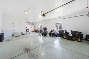 Garage featuring epoxy floors