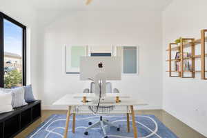 Home office featuring baseboards