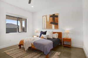 Bedroom featuring concrete floors, a ceiling fan, and recessed lighting