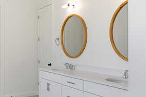Bathroom featuring double vanity