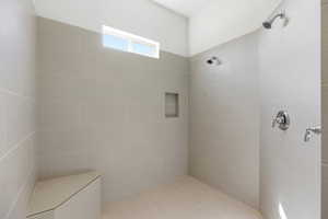 Full bathroom with tiled shower