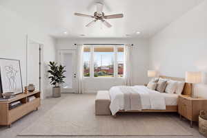 Bedroom featuring access to outside, light colored carpet, a ceiling fan, and recessed lighting