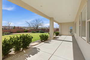 Fenced backyard featuring a patio area