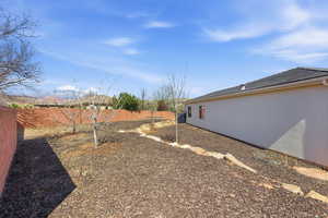View of fenced backyard