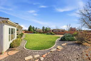 View of fenced backyard