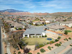 Aerial view of residential area featuring a mountain backdrop