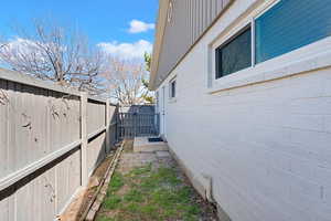 View of fenced backyard