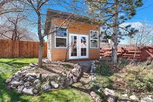 View of outdoor structure with french doors