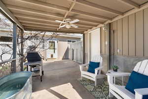 View of patio / terrace featuring a ceiling fan and a gate