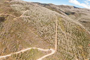 View of mountain backdrop with rural landscape