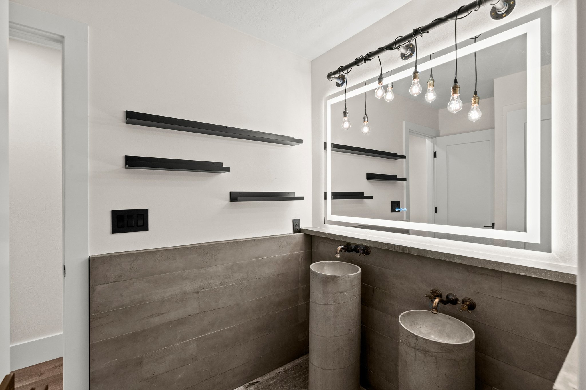 Bathroom with tile walls and wainscoting