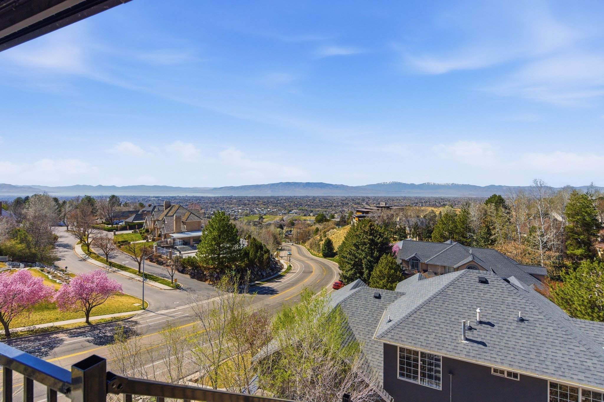 Aerial perspective of suburban area with a mountain backdrop