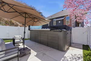View of patio / terrace featuring a gate and outdoor furniture