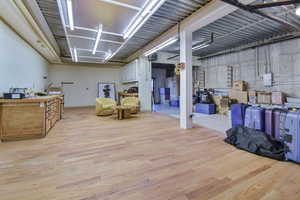 Below grade area featuring light wood-type flooring